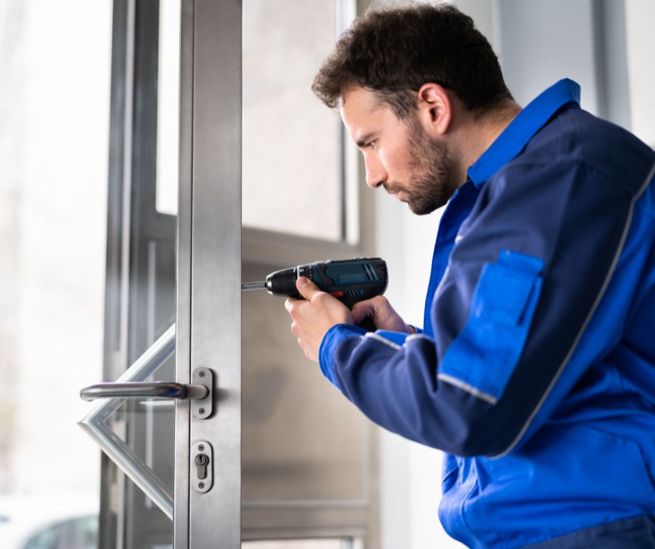 A skilled commercial locksmith work, reinforcing business security with precision and expertise.